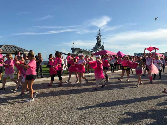 people supports Bras Across the Causeway” event