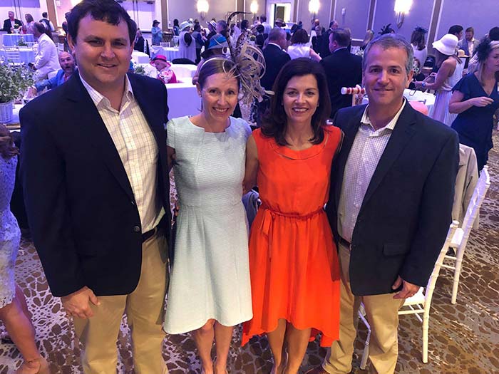 Dr. Curry McEvoy and wife Morgan, Dr. Reece Jones and wife Jennifer