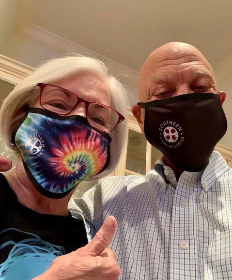 Elderly man and woman wearing mask